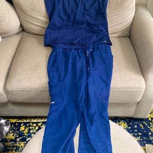 4 scrub pants and 6 scrub shirts- Grey’s Anatomy Brand.